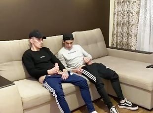 Two friends jerk off in sporwear