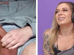 A tattooed beauty at a casting watches a video of men jerking off big dicks