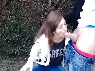 Teen brunette blowjob in garden