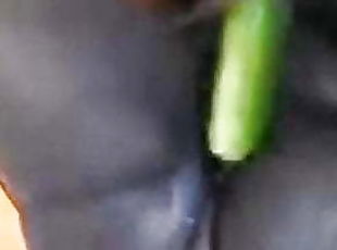 Ebony wife and cucumber 