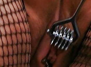 Pin wheel, fingerings, red butt plug, fishnet net, lingerie