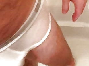 Pissing on   dad, in white briefs