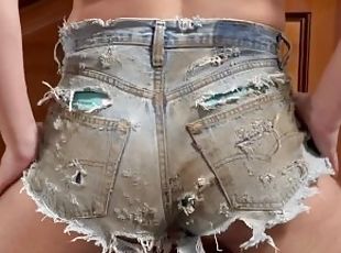 Enjoying dirty torn Levis 501 jean cutoffs