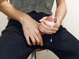 A young male masturbates his big dick with a frozen cube of sperm and cums