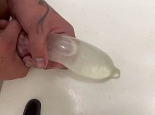 nickstar6 Feeds a condom filled with water until ejaculation