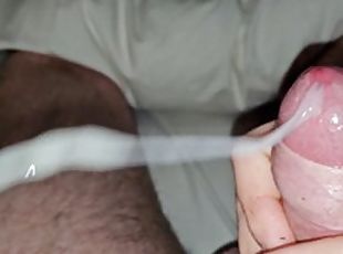 Big dick wanked off to a strong, long cumshot (almost hit the camera)