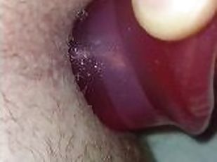 Close up view inserting and pulling out my xxl tunnel plug