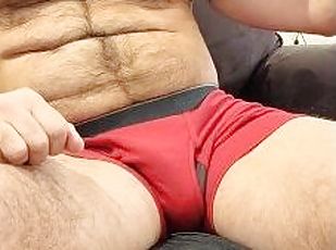 HAIRY MUSCLE BEAR FLEXING IN BOXER BRIEFS