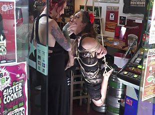 Lesbian whore endures nasty bondage moments at the shop