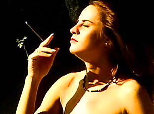 Smoking beauty poses outside