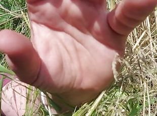 Mini video masturbating in the field.