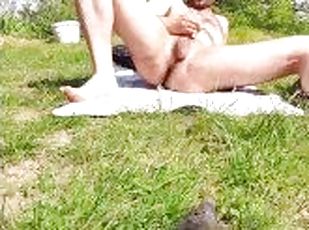 Horrny Exhibitionist Jerks and Stretches While Sunbathing in Public Forest