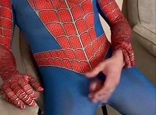 Spiderman removes his mask whilst masturbating